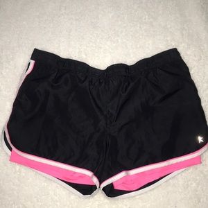 Black and pink athletic shorts